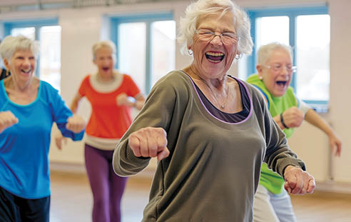 A group of older women are dancing in a room. AI generated content