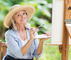 A woman in a yellow shirt is smiling and dancing in a group of people. AI generated content